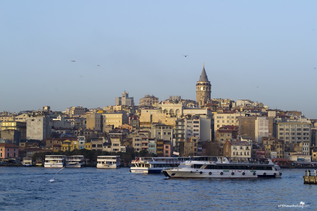 View of the Galata district from the Bosphorus ferry in Istanbul Turkey