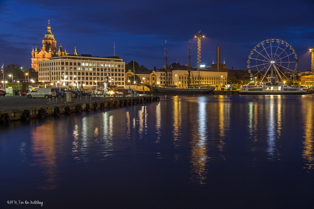 The Uspenski Cathedral and the Finnair Sky Wheel in Helsinki at night